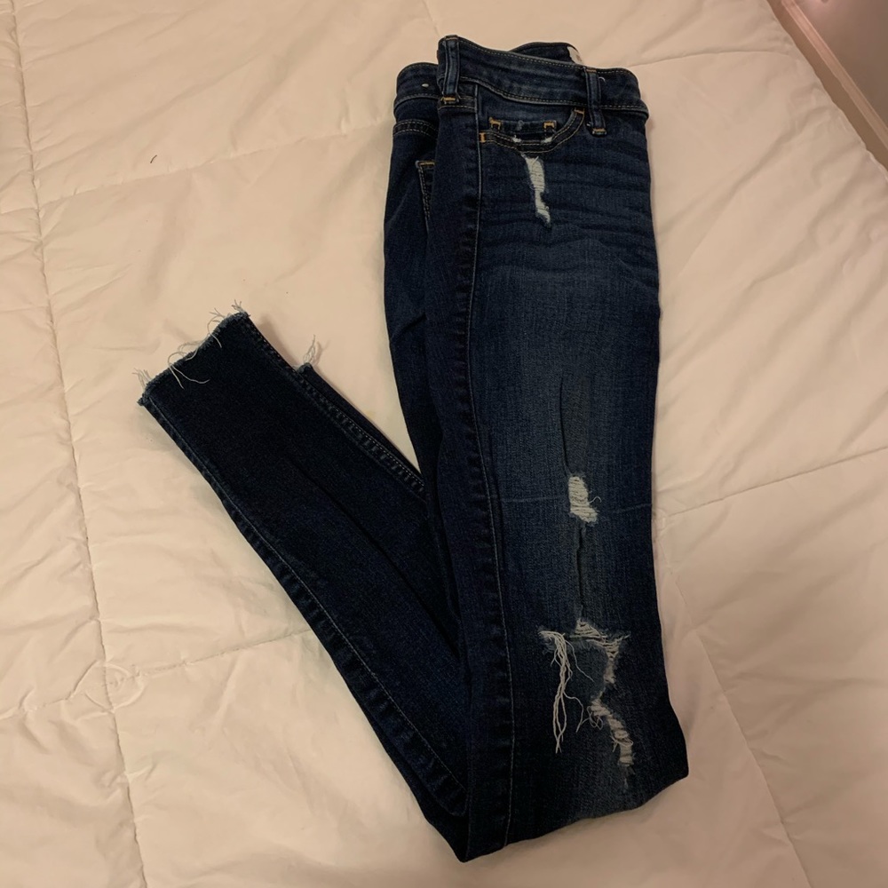 Dark wash destroyed jeans